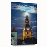 Large abstract wall art of a European landscape in muted blue and green hues on acrylic glass.