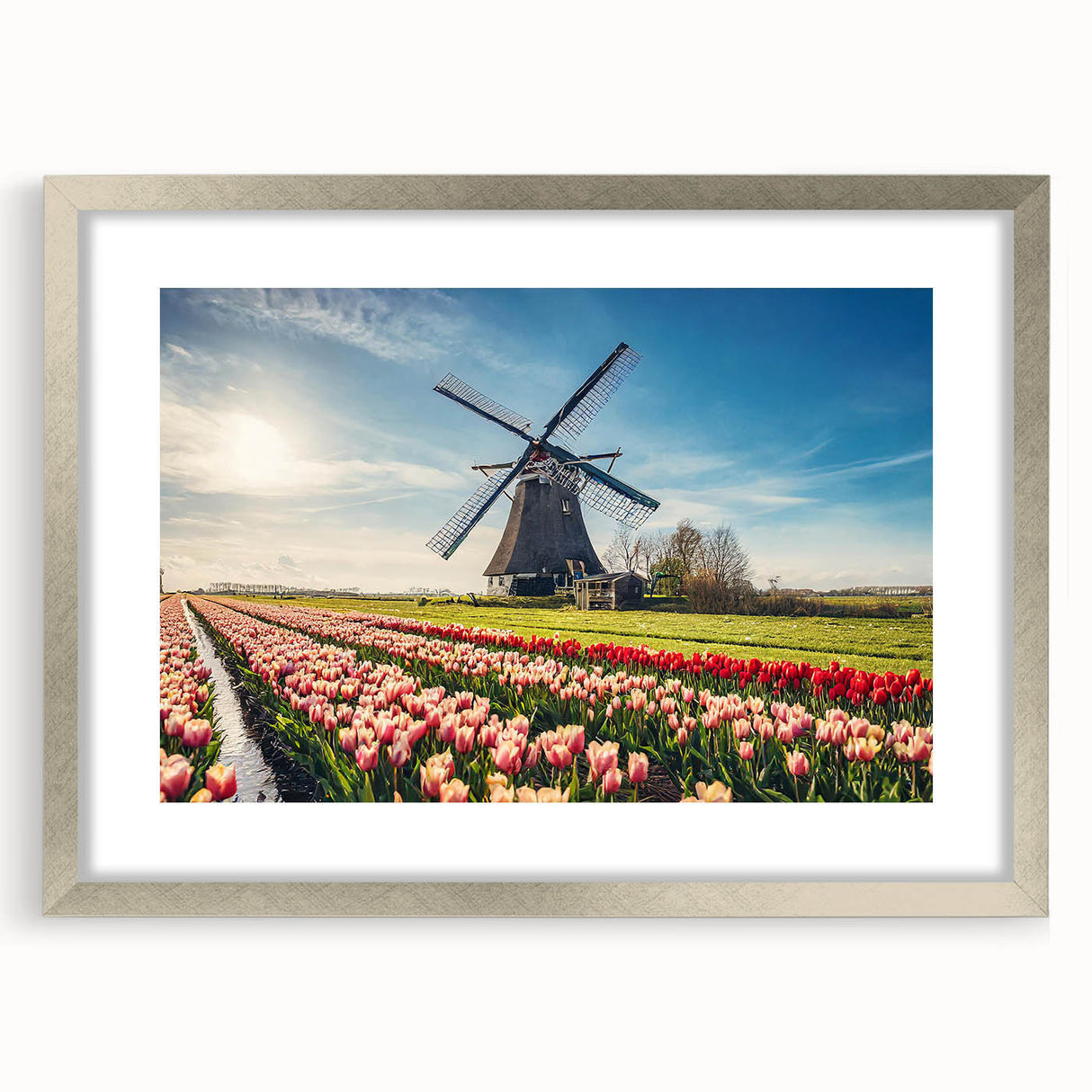 Extra large abstract art print of a textured European scenery in muted earth tones, framed in silver.