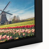 Extra large framed canvas featuring a textured black wall art scene of a European cityscape with colorful details.