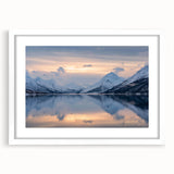 Textured abstract art print of a Norwegian landscape in muted earth tones on a framed white mat, suitable for bedroom decor.