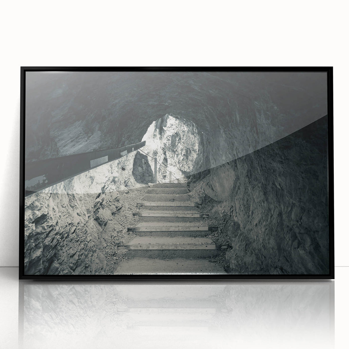Large abstract wall art depicting a European Slovenian landscape in muted greens and blues, framed in black acrylic.