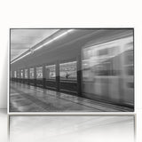 Mid-century modernist art depicting Barcelona scenery in muted earth tones on a white framed acrylic.