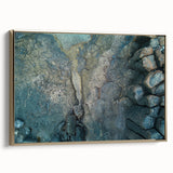 Framed canvas depicting a vintage-style landscape painting of the Canary Islands in muted gold and black tones.