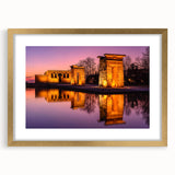 Extra large abstract print of Madrid scenery in muted earth tones on a textured canvas, framed in gold.