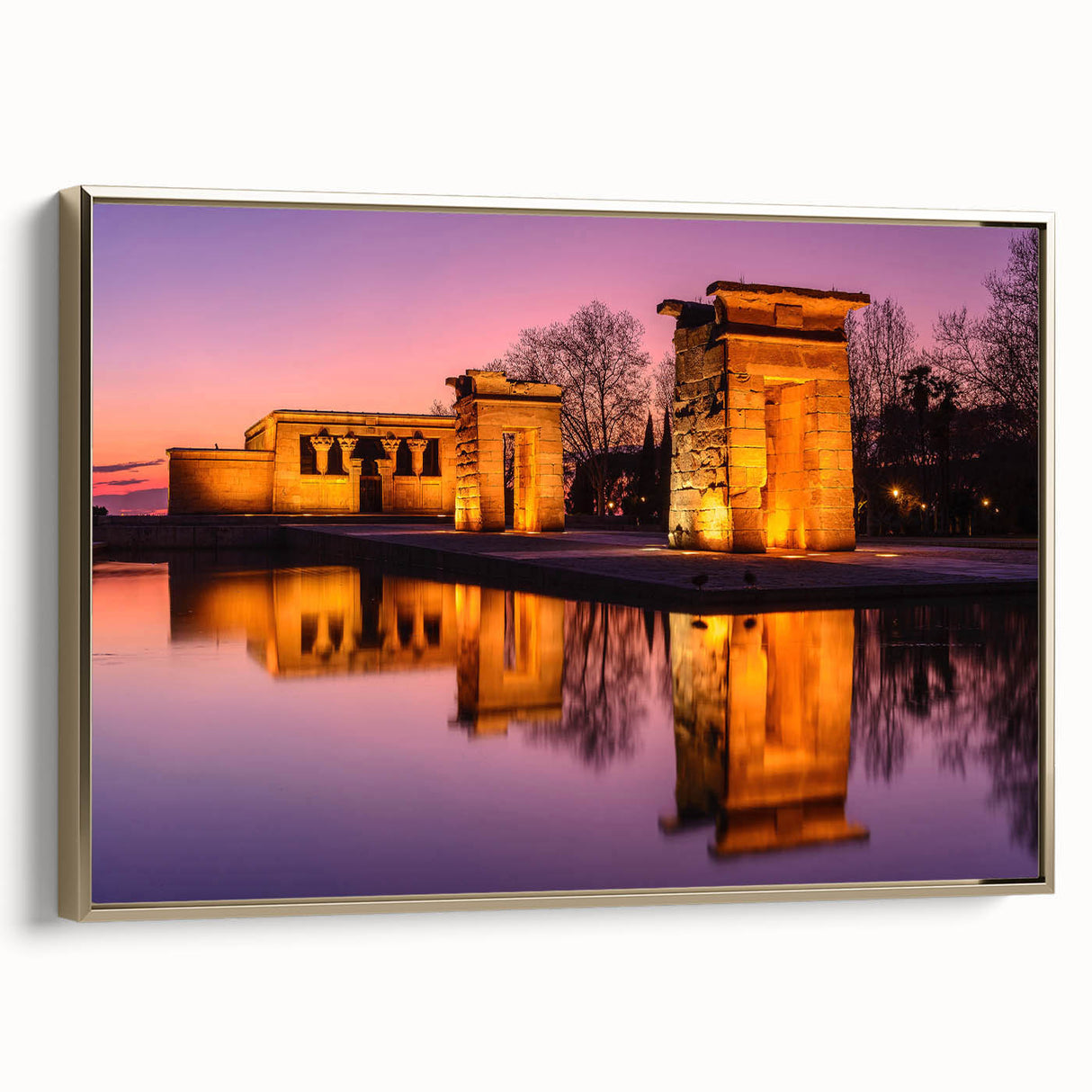 Framed canvas featuring a vintage-style landscape painting of Madrid with a black and gold color scheme.