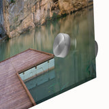 Large abstract wall art of Valencia's cityscape in muted blue and orange tones on acrylic glass.