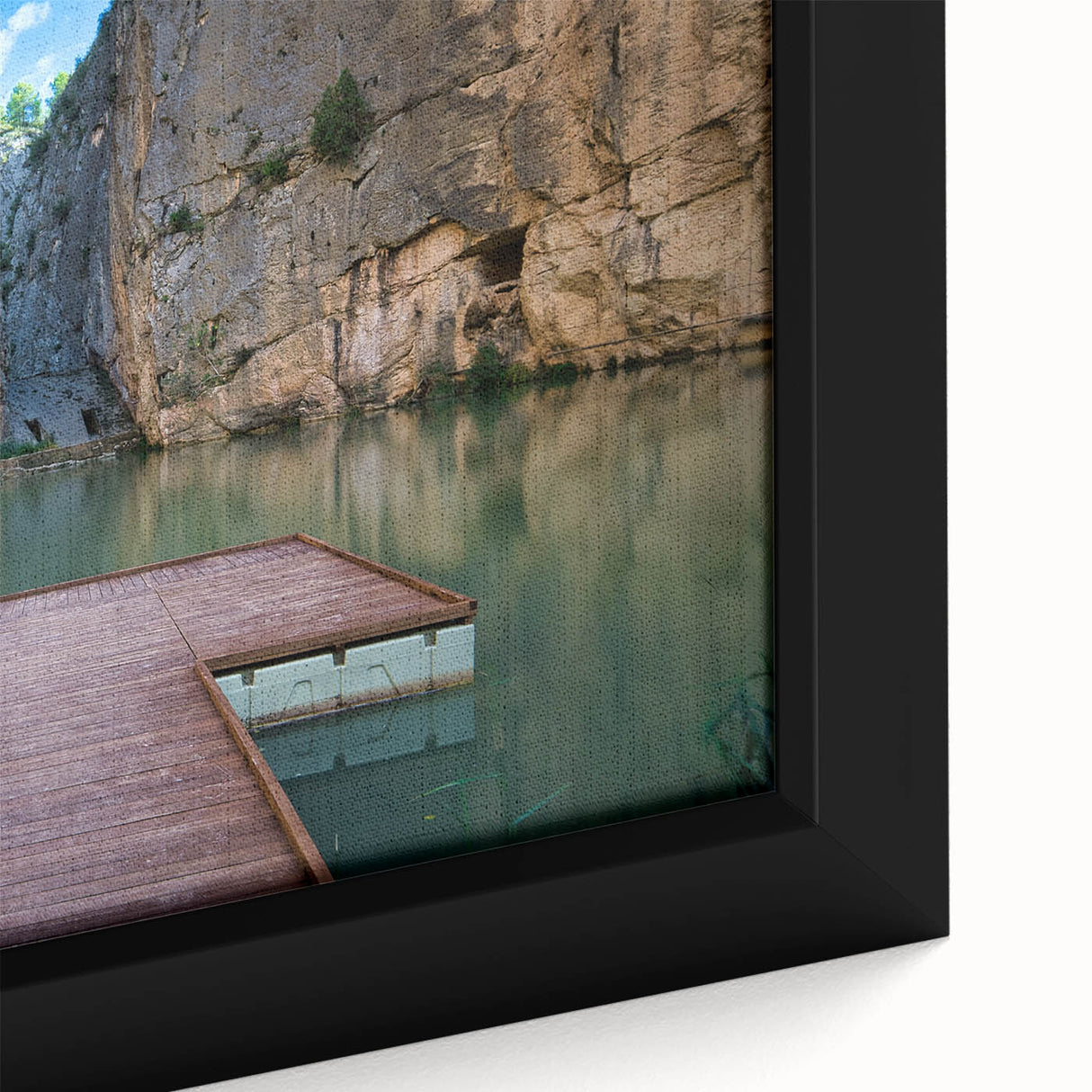 Close-up of a black wall art piece depicting vibrant, textured scenery of Valencia, Spain on a framed canvas.