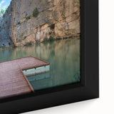 Close-up of a black wall art piece depicting vibrant, textured scenery of Valencia, Spain on a framed canvas.