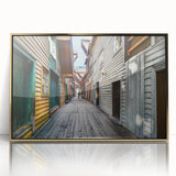 Large art print of Stockholm scenery in mid-century modernist style, with muted gold and blue tones on a framed acrylic.