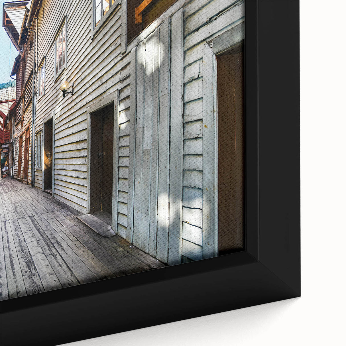 Close-up of extra large, framed canvas featuring a textured depiction of Stockholm in black with colorful accents.
