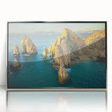 Mid-century modernist art depicting Baja California scenery in muted earth tones on a silver-framed acrylic print.