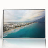 Art deco poster of Quintana Roo scenery in muted blue and green hues, framed in white acrylic.