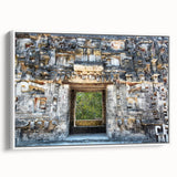 Framed canvas depicting a vintage poster art of Yucatan, Mexico, with vibrant colors on a black background.