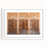 Abstract art print of Dubai skyline in muted gray and blue tones on a framed white mat, suitable for dining room decor.