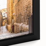 Black wall art featuring a textured Jerusalem cityscape in vibrant colors on a framed canvas, ideal for living room decor.