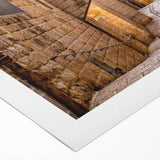 Art Deco poster of Jerusalem skyline in muted gold and blue tones on rolled canvas, suitable for dining room decor.