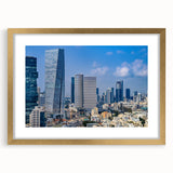 Extra large abstract art print of Tel Aviv skyline, textured in vibrant gold and blue hues on framed canvas.