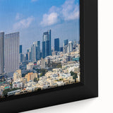 Extra large framed canvas depicting a textured cityscape of Tel Aviv in black with vibrant colorful accents.
