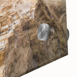Large abstract wall art depicting a Middle-Eastern desert scene in muted earth tones on acrylic glass.