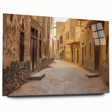 Large abstract wall art depicting a Middle Eastern desert scene in muted earth tones on acrylic glass.