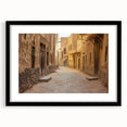 Colorful abstract art print of a textured Middle Eastern scenery in a black frame, ideal for living room decor.