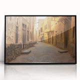 Large abstract wall art depicting a Saudi Arabian scenery in muted earth tones on a framed acrylic.