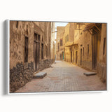 Vintage poster art of a Middle Eastern scenery on a framed canvas, featuring vibrant colors, ideal for living room decor.