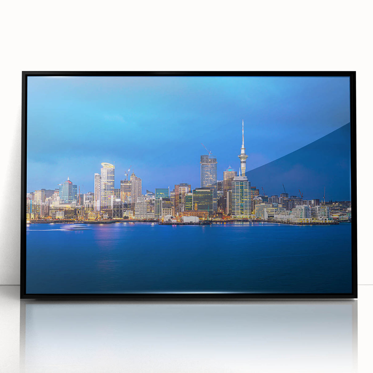 Large abstract wall art depicting Auckland's skyline in muted gray and blue tones on a framed acrylic panel.