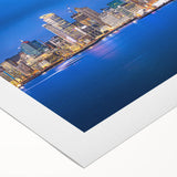 Art deco poster of Auckland skyline in muted blue tones on rolled canvas, suitable for dining room wall art.