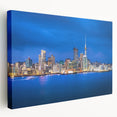 Side view of a stretched canvas featuring a realistic depiction of Auckland's coastal scenery, ideal for kitchen wall art.