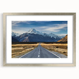 Textured art depicting an abstract New Zealand Canterbury landscape in muted earth tones on a framed silver mat.