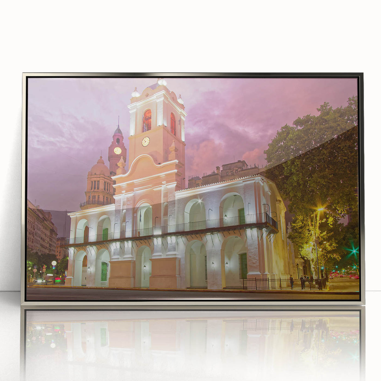 Mid-century modernist art depicting a Buenos Aires cityscape in muted gray and blue tones, framed in silver acrylic.