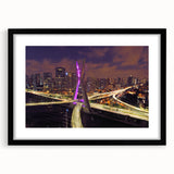 Extra large abstract art print featuring a vibrant, textured depiction of a Brazilian landscape on a black framed canvas.