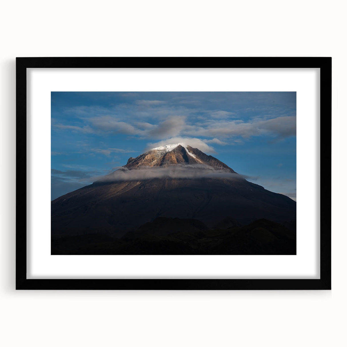 Abstract art print of a colorful Colombian landscape in textured style, framed in black, ideal for living room decor.