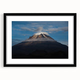 Abstract art print of a colorful Colombian landscape in textured style, framed in black, ideal for living room decor.