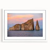 Abstract art print of Galapagos scenery in muted earth tones on a white framed poster.