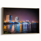 Framed canvas featuring a vintage-style landscape painting of an Ecuadorian scenery in black and gold tones.