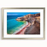 Textured abstract art print depicting a South American landscape in earth tones, framed in silver.