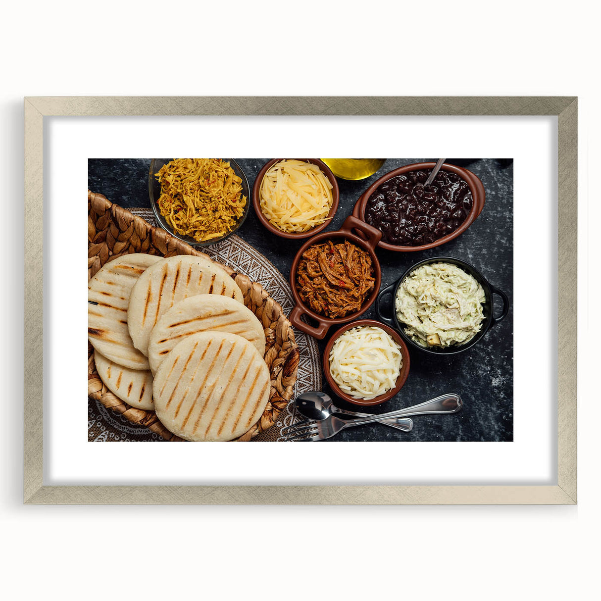 Abstract textured art print depicting a vibrant South American landscape, framed in silver, ideal for bedroom decor.