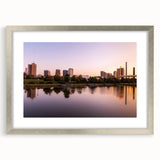 Textured abstract art print depicting a serene Alabama landscape in muted earth tones, framed in silver.