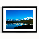 Extra large abstract art print of Denali, Alaska, featuring vibrant colors and textured design on a black framed canvas.