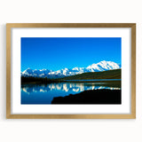 Extra large abstract art print depicting Alaska's Denali scenery in textured gold frame, ideal for living room decor.