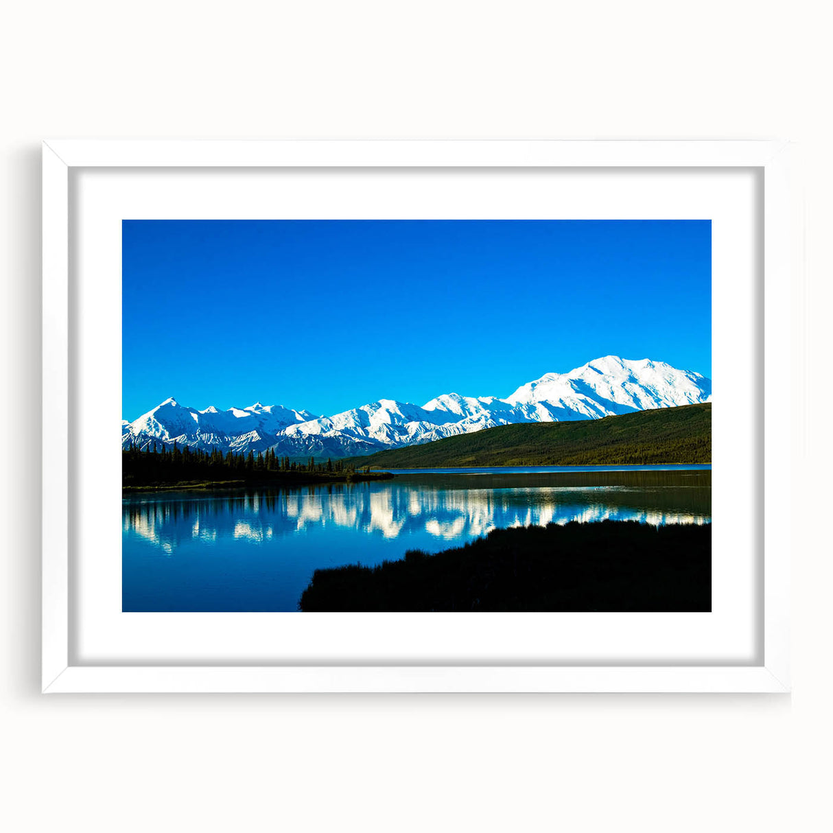 Abstract art print of Denali, Alaska, in muted earth tones on a framed white mat, ideal for bedroom or dining room decor.