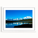 Abstract art print of Denali, Alaska, in muted earth tones on a framed white mat, ideal for bedroom or dining room decor.