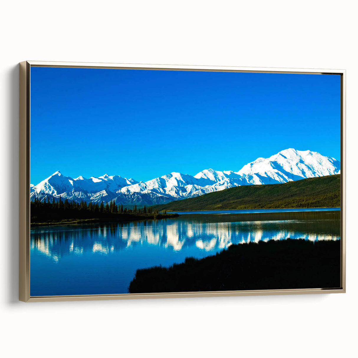 Framed canvas featuring a landscape painting of Denali, Alaska, in muted earth tones, ideal for bedroom wall art.