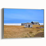 Framed canvas featuring a landscape art painting of an Alaskan scene in muted earth tones.