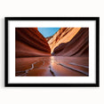 Colorful abstract art print of Arizona's Coyote Buttes on a textured canvas, framed in black, ideal for living room decor.