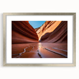 Textured art print of Arizona's Coyote Buttes in muted earth tones on a framed silver mat, ideal for bedroom decor.
