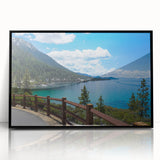Large abstract wall art depicting Lake Tahoe in muted blue and green tones, framed in black acrylic.