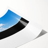 Extra large wall art featuring a scenic view of Lake Tahoe with vibrant blue and green tones on a rolled canvas.